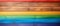 Close-Up of a Rainbow Colored Wooden Wall