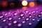 Close up Raindrops on window with soothing purple light illuminating them