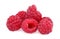 Close-up raspberry. Raw, ripe, juicy, pink raspberries isolated on a white background. Raspberry flavor. Summer berries.