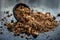 Close up of raw amla or Phyllanthus emblica or Indian gooseberry in a fruit basket with its dried seed powder in a clay bowl used