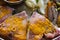 Close up of raw fish in turmeric powder with use of selective focus on a particular tip of fish meat