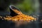 Close up of Raw Masur dal or masoor lentils or pink lentils in a black colored clay bowl on wooden surface.