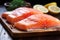 Close up Raw salmon fillets on a natural, wooden table setting