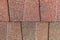 Close up red asphalt shingle background