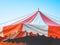 Close up of red big top carnival tents or Circus striped tent.