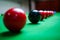 Close up of red and black balls on Snooker table