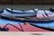 Close up of red and blue kayaks reflect outdoor adventure fun