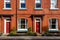 close-up of a red-brick georgian townhouse showcasing its details