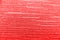 Close up red corrugated paper background.