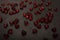 Close-up on a red glass hearts on a dark background. Valentine\\\'s concept. Symbol of love and Valentine\\\'s day.