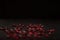 Close-up on a red glass hearts on a dark background. Valentine\\\'s concept. Symbol of love and Valentine\\\'s day.