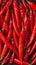 Close up of red hot chili peppers texture background, copy space