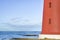 Close up of red lighthouse in Finnmark, Northern Norway