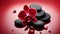 Close up of a red orchid with basalt stones on red colored background