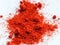 close up of red powder chili paprika white background food spice