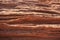 Close-up of a red rock with details sculpted naturally by the winds.