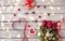 Close up of red roses, gift, candies and candle