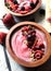 close up red smoothie bowl