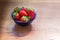 Close up red Strawberry isolated on blue bowl