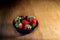 Close up red Strawberry isolated on blue bowl