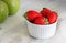 Close up red Strawberry isolated on white bowl