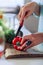 Close up of a red tasty pepper on the cutting board