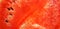 Close-up of red watermelon. background. The pulp of a ripe watermelon. watermelon texture. A piece of juicy ripe watermelon. A