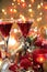 Close-up of red wine in glasses,candle and baubles