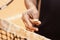 Close up of referee hands flipping a coin before starting the game or match