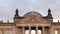 Close up of the reichstag pediment and dome in berlin, germany