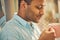 Close up of relaxed man going to drink tea