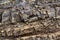 Close-up relief of big rocks. Natural igneous rock background texture