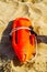 Close up of a rescue buoys in the sand of a beach in the Medite