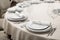 Close-up of a reserved table in a restaurant. Expensively decorated restaurant table
