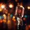 Close up of a retro microphone on stage with bokeh background
