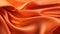 Close-up reveals flowing orange satin with a smooth, luxurious texture, exuding elegance. Ai Generated