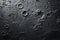 A close-up reveals the rugged texture of the moon's surface, scars from aeons past.