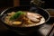 close-up of rich and creamy ramen broth, with floating slices of roast pork