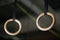 Close-up of the rings, as steady rings or still rings, an artistic gymnastics apparatus on a light blurred background.