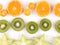 Close-up of a ripe exotic slices of fruits isolated on a white background.