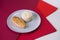 Close up of Roasted chicken fillet With boiled rice. Breakfast on colorful red background. Main and side dish in one plate.