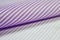 Close up roll purple and white strip fabric of shirt