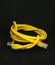 Close-up of a rolled yellow cable internet access