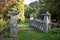 A close up of this Romantic stone bridge with tree`s and shrubs of all different sizes and shapes in the background