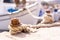 Close up of a rope knot holding moored boat