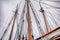 Close up of the ropes, lines, masts and sails of a tall ship