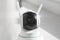 Close-up of a rotating head CCTV camera for a home. 360 degree rotation, object tracking. Home safety, babysitting and