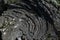 Close-up of the rotating lava blades of an old viscous flow, in the volcano crater area, Vesuvius, Naples, Campania, Italy