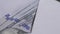 Close-up of a rotating paper envelope with hundred-dollar bills.