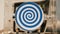 Close up of rotating white flat circle with bright blue spiral that creating hypnotic effect. HDR. Unusual robot with